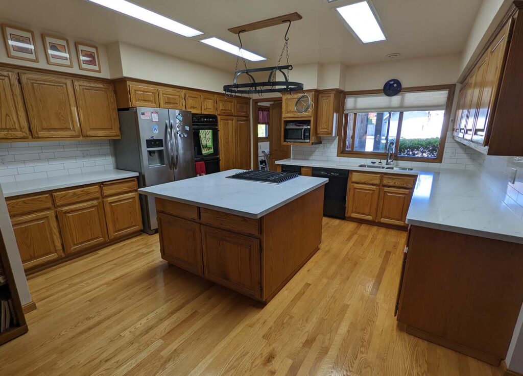 An interior view of a large kitchen.