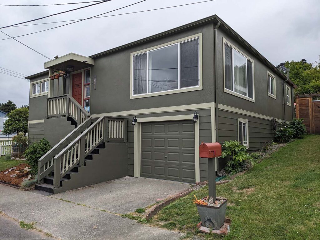 An exterior photo of a freshly-painted house